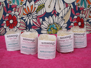 unsoap butter scrub bar with pink himalayan salt exfoliant in package