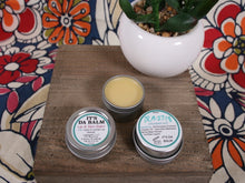 Load image into Gallery viewer, lip balm and skin balm made with vanilla-infused jojoba oil, beeswax, and vanilla extract