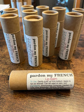 Load image into Gallery viewer, Fan favorite pardon my FRENCH now available in a paper tube! Same amazing ingredients - jojoba oil, beeswax, essential oils - just different packaging. 