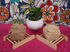 unsoap butter scrub bars, one with ground apricot shells exfoliant and one with pink himalayan salt exfoliant